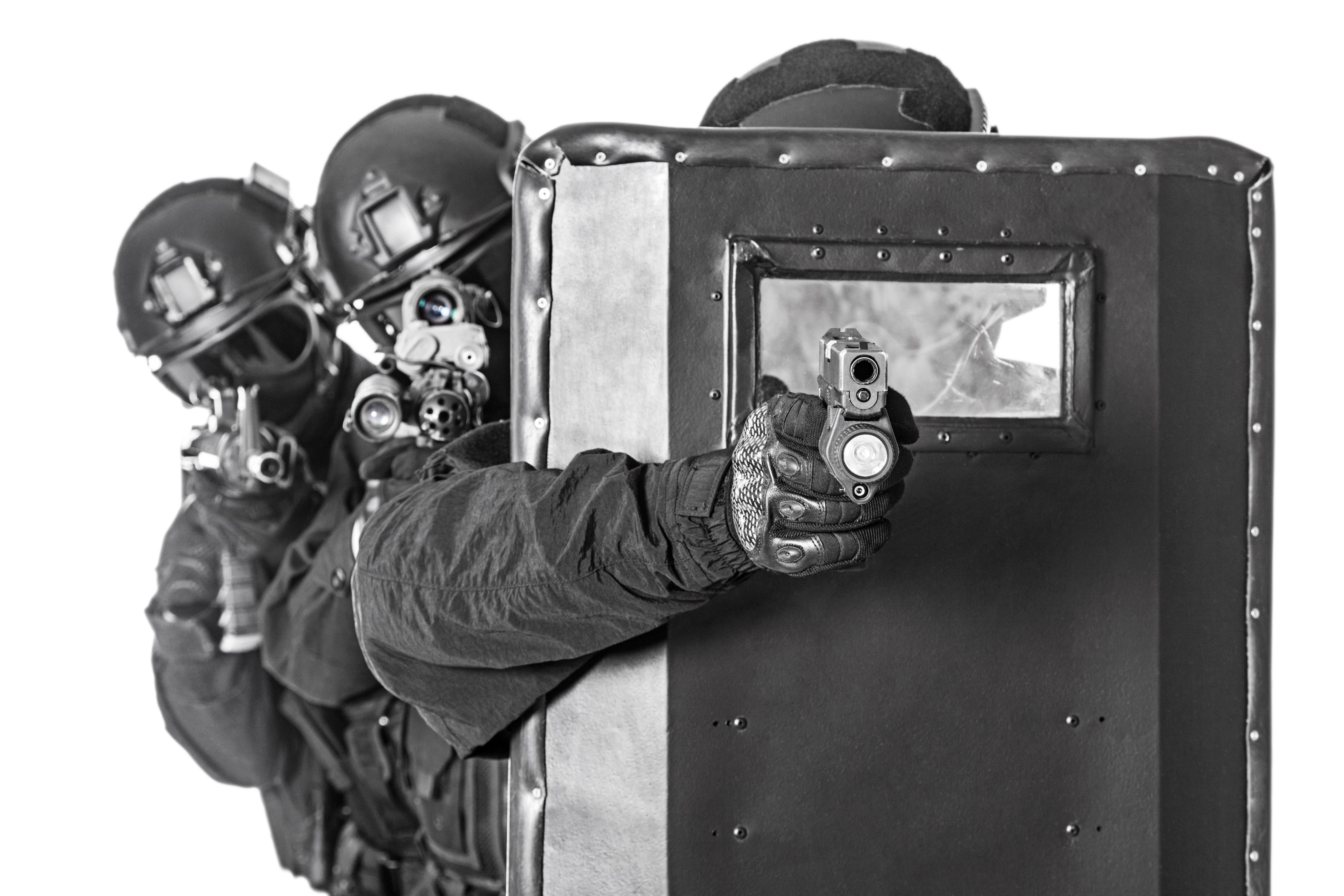 tactical SWAT using a ballistic shield 