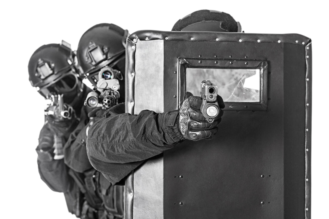 tactical SWAT using a ballistic shield 