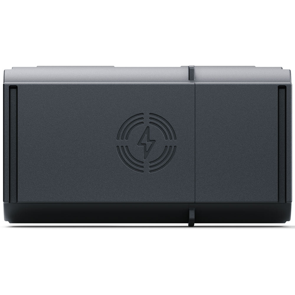 A dark gray rectangular electronic device with a matte finish, featuring a circular lightning bolt symbol inside concentric rings on the front center, set against a plain white background.