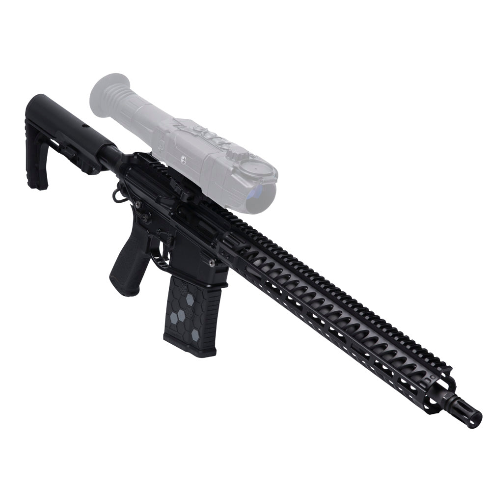 A black tactical rifle with a mounted thermal imaging scope, shown on a plain white background with a semi-transparent ghosted overlay of the scope.