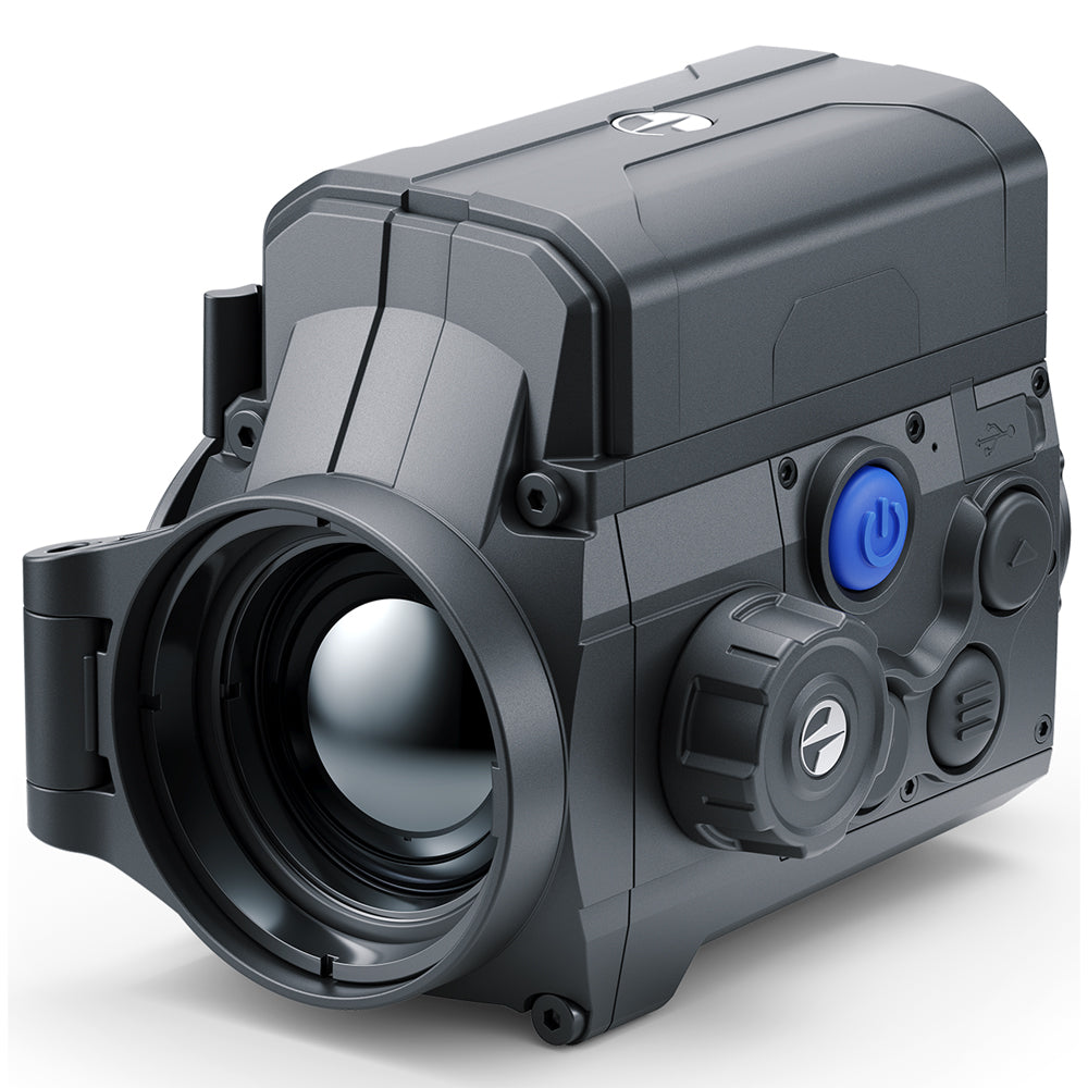 A black tactical red dot sight or rifle optic with a large front lens, textured adjustment knobs, and a prominent blue power button, shown on a white background.