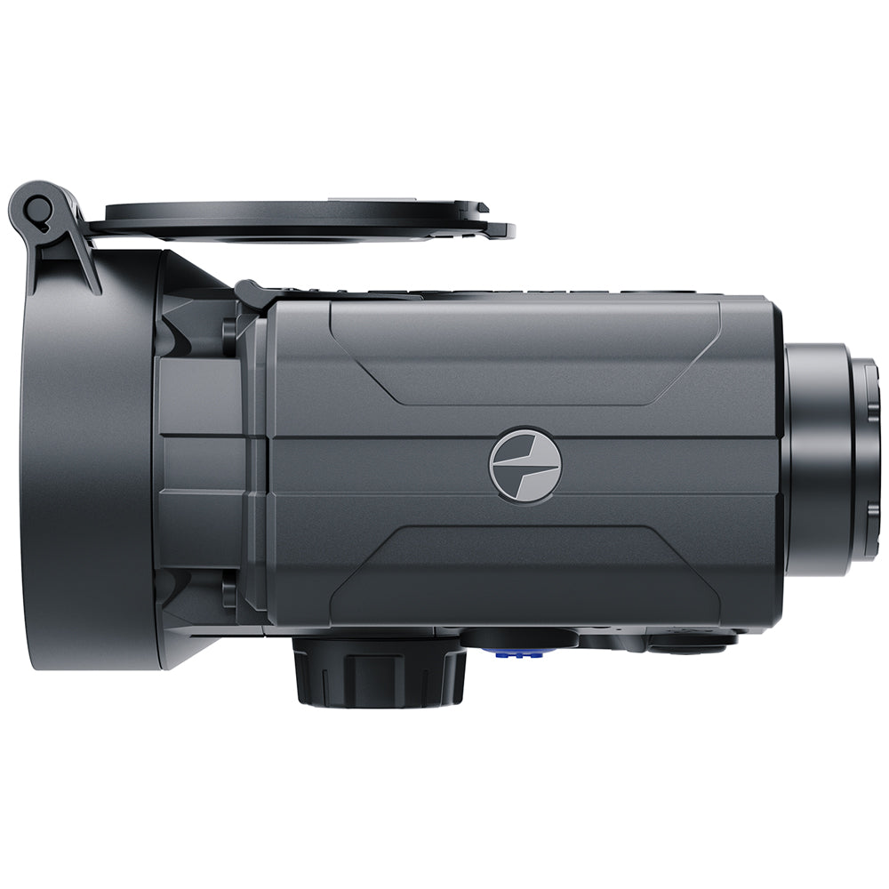 A dark gray tactical camera or thermal device with an open lid on top, shown from a side profile view against a solid white background.