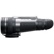 A Pulsar thermal monocular camera shown in profile against a solid white background, featuring a black and silver body with a mounting base attached.