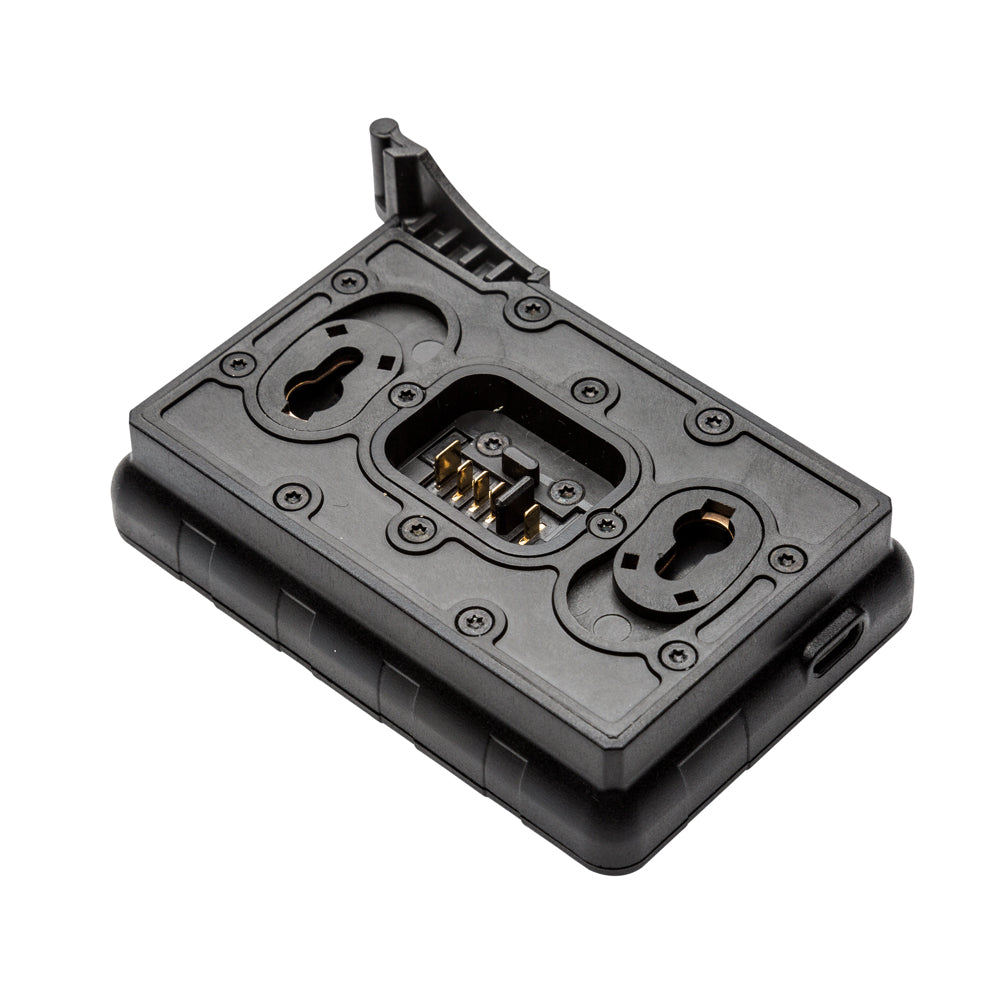 Black camera accessory with multiple ports on a white background