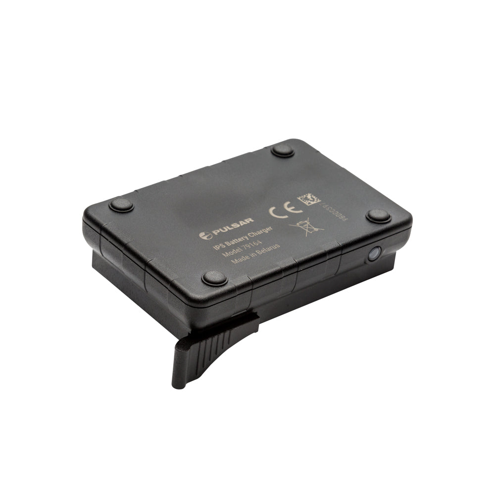 A black rectangular electronic device, identified as a Pulsar 9V battery charger, shown from an elevated angle on a plain white background.