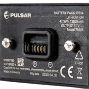 Close-up of the rear of a Pulsar IPS14 lithium-ion battery pack, showing the connector port, terminal screws, and printed specifications and safety markings.