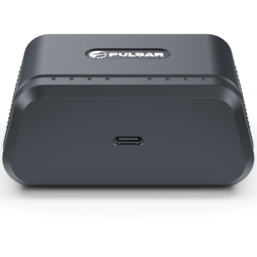 A dark gray Pulsar electronic device with a USB-C port on the front, shown on a clean white background.