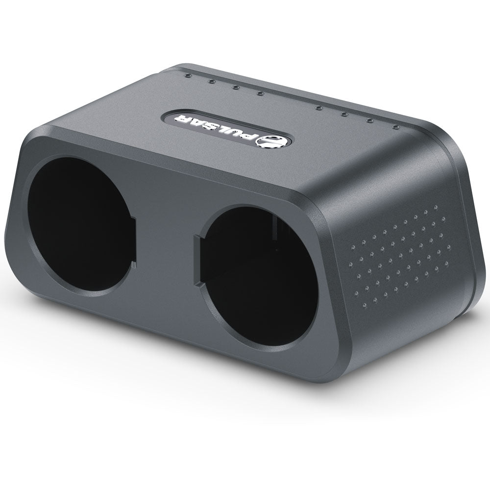 A dark gray dual-port electronic device, likely a dual charger or dual monitor, with a matte finish, featuring two circular openings on the front, a brand logo on top, and ventilation holes on the side, set against a plain white background.