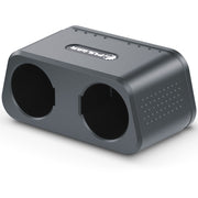 A dark gray dual-port electronic device, likely a dual charger or dual monitor, with a matte finish, featuring two circular openings on the front, a brand logo on top, and ventilation holes on the side, set against a plain white background.