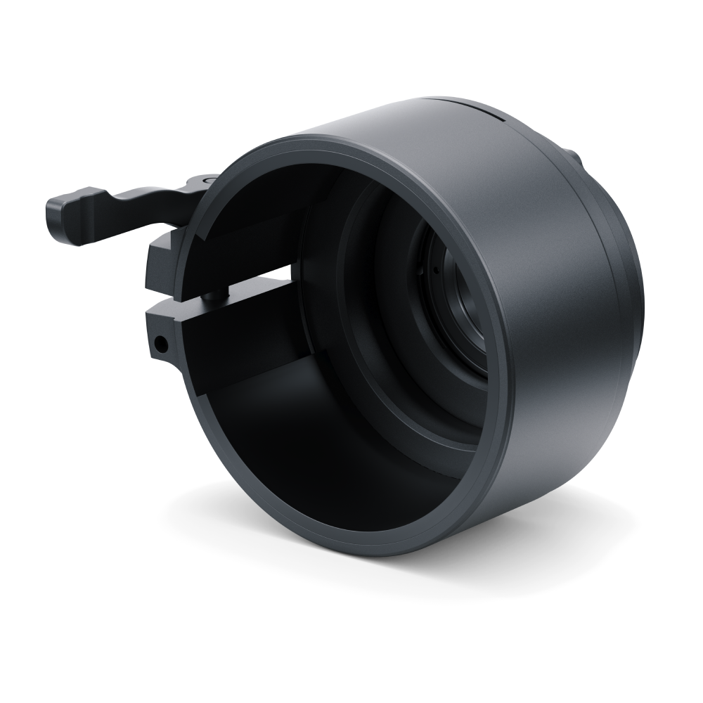 A black cylindrical lens hood or filter mount with a small protruding tab on the left, shown at an angle on a clean white background.