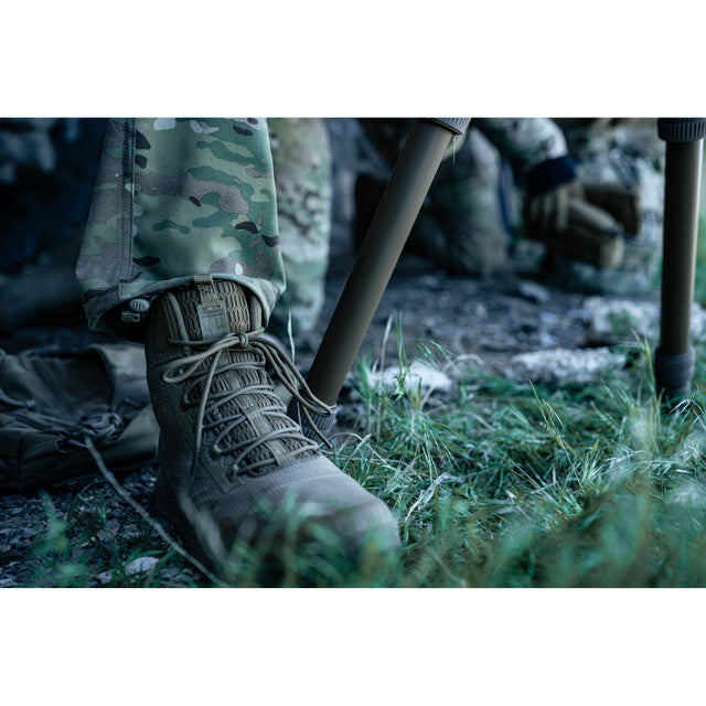 Close-up of Coyote Nano X1 Adventure Tactical Boots in a grassy field
