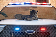 Reebok Fuel Flex tactical boots on a police car