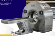 VMI Flatscan 3D tomographic gantry and motorised stretcher, angled view