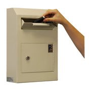 Protex WDS-150 beige hand inserting envelope through the anti-fish drop slot